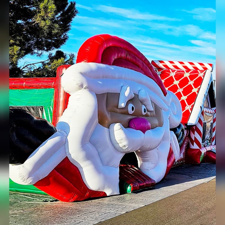 Santa-themed bounce house rental